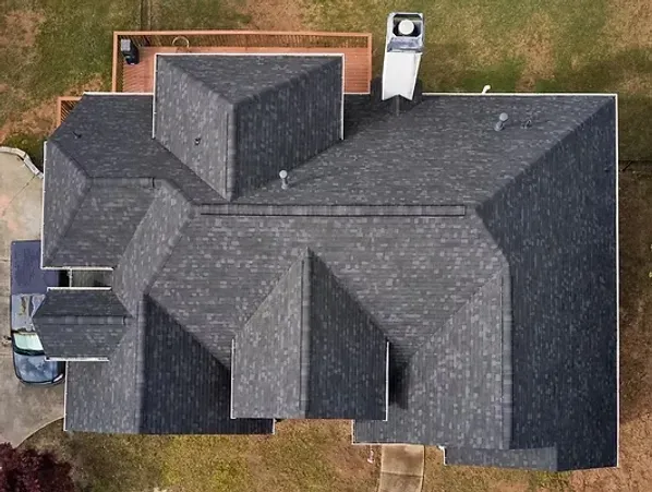 A house with a newly installed roof, showing our commitment to quality.
